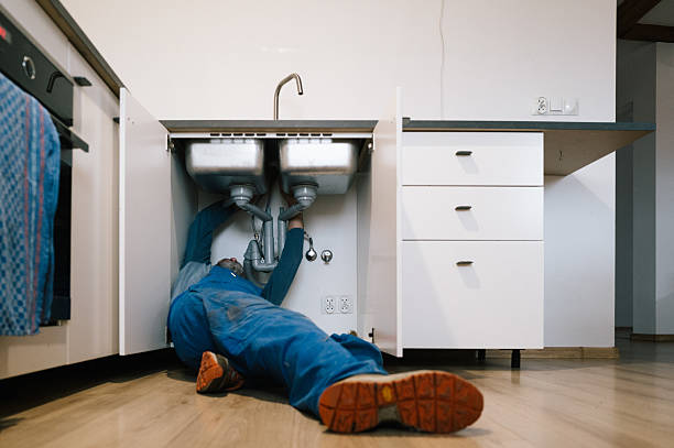 Professional Emergency Plumber technician working in Arlington Heights, MA